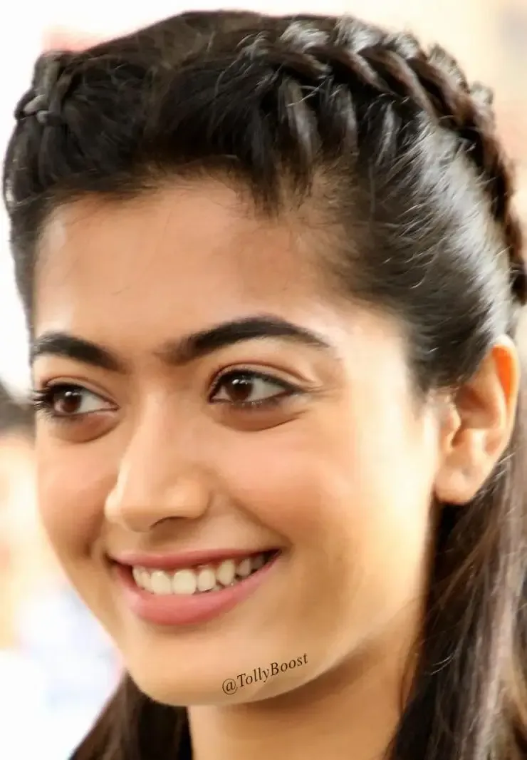 INDIAN ACTRESS RASHMIKA MANDANNA LONG HAIR SMILING FACE CLOSEUP 2